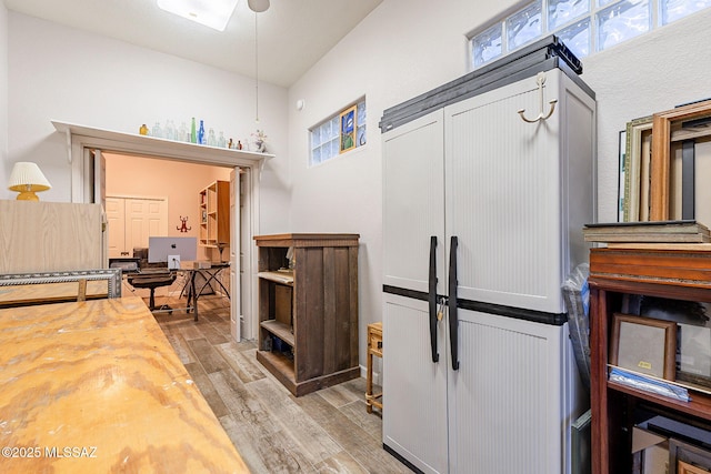 kitchen with light hardwood / wood-style floors