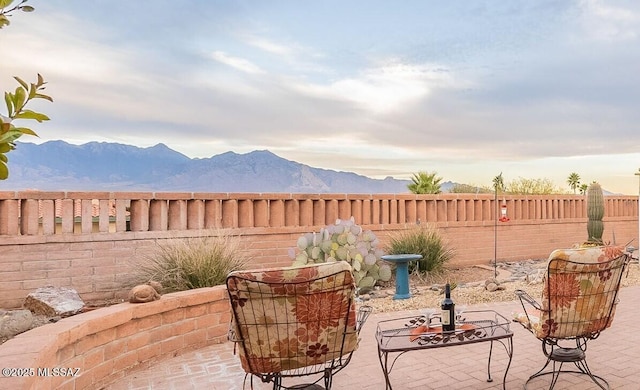 view of patio featuring a mountain view