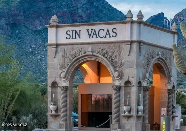 entrance to property with a mountain view