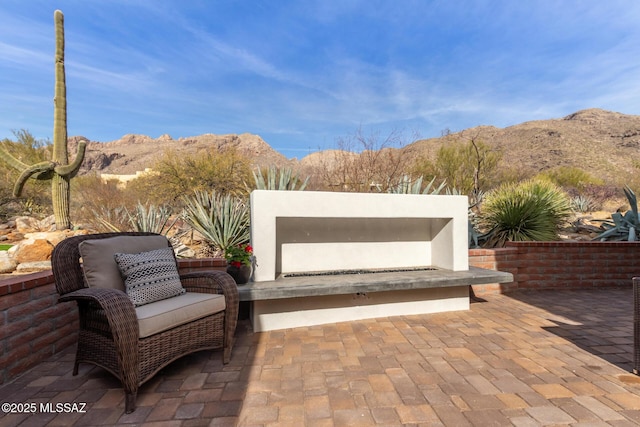 view of patio with a mountain view