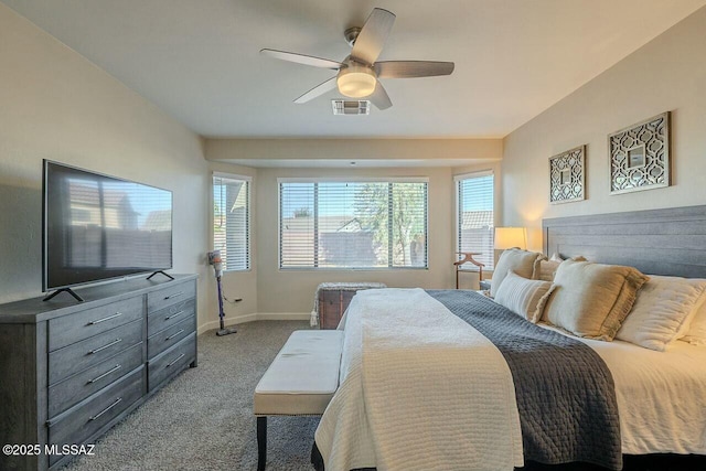 bedroom featuring baseboards, carpet floors, ceiling fan, and visible vents