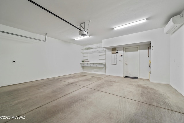 garage with a garage door opener and a wall mounted AC