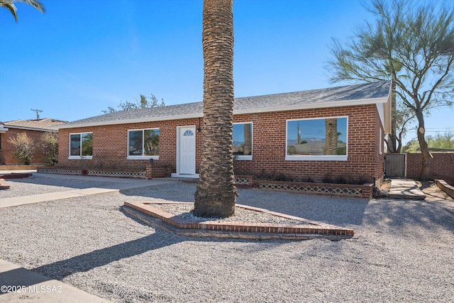 single story home featuring a patio area