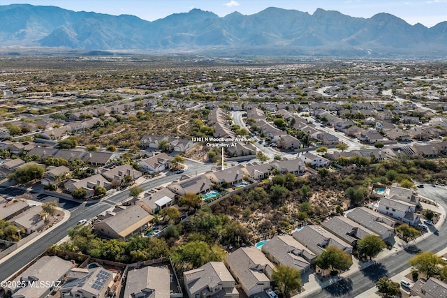 drone / aerial view featuring a mountain view