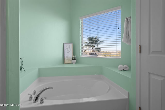 bathroom featuring a tub