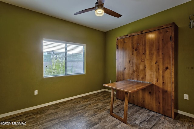 office with ceiling fan and dark hardwood / wood-style floors