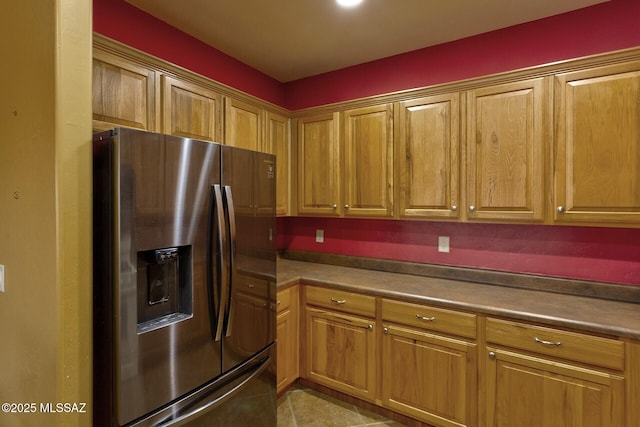 kitchen with stainless steel refrigerator with ice dispenser