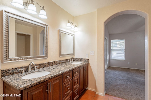 bathroom with vanity and tile patterned floors