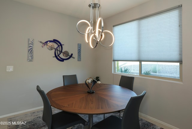 dining room featuring a chandelier