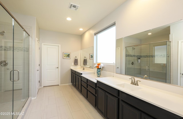 bathroom with vanity and walk in shower