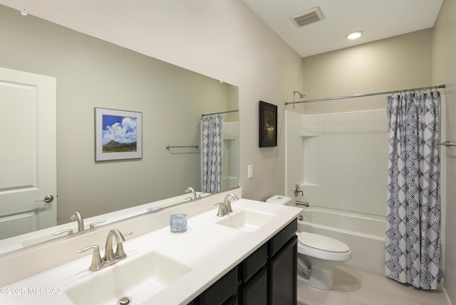 full bathroom featuring vanity, shower / bath combination with curtain, and toilet