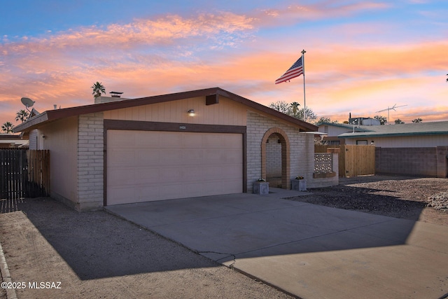 ranch-style home with a garage