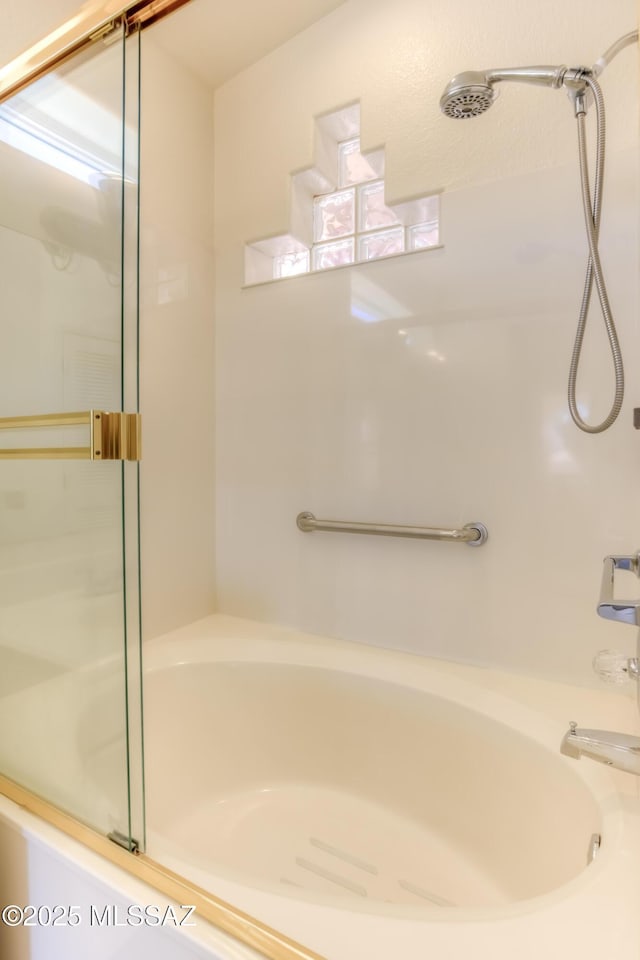 bathroom with shower with separate bathtub