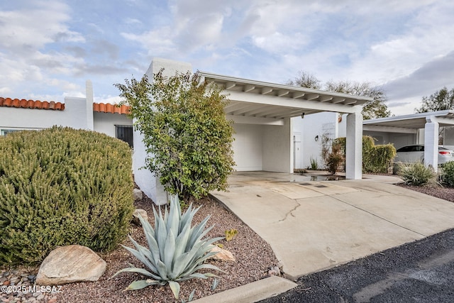 view of front of house with a carport