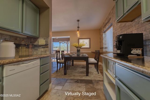 dining room featuring stone tile flooring