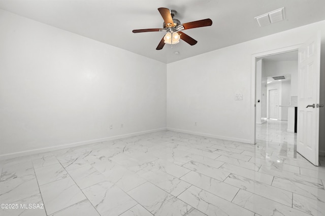 unfurnished room featuring ceiling fan