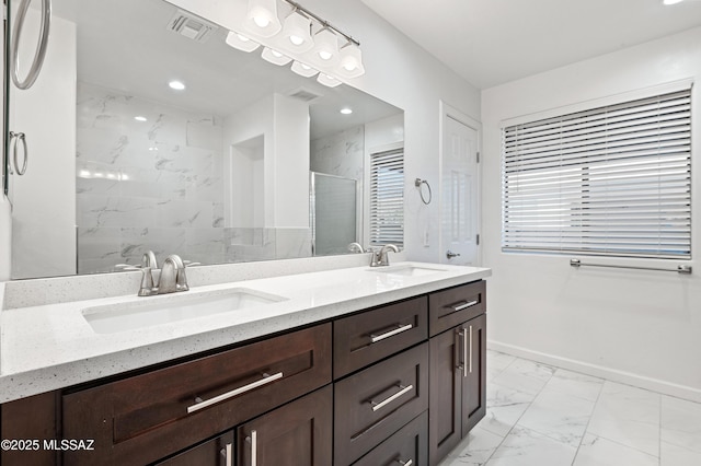 bathroom with vanity and walk in shower