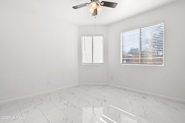 unfurnished room featuring ceiling fan