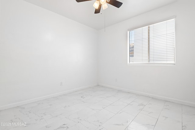 unfurnished room featuring ceiling fan