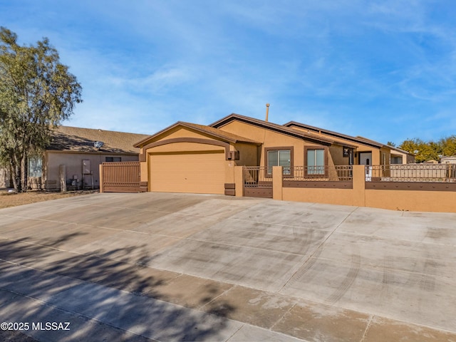 single story home featuring a garage