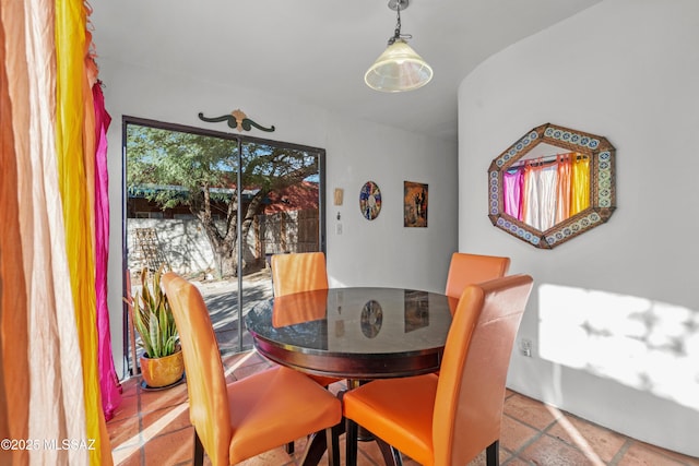 view of tiled dining space