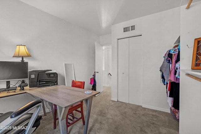 home office featuring light colored carpet