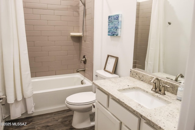 full bathroom featuring vanity, toilet, shower / tub combo with curtain, and wood-type flooring