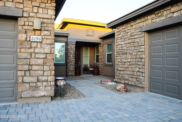 property entrance with a garage