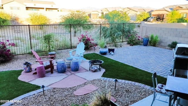 exterior space with an outdoor fire pit