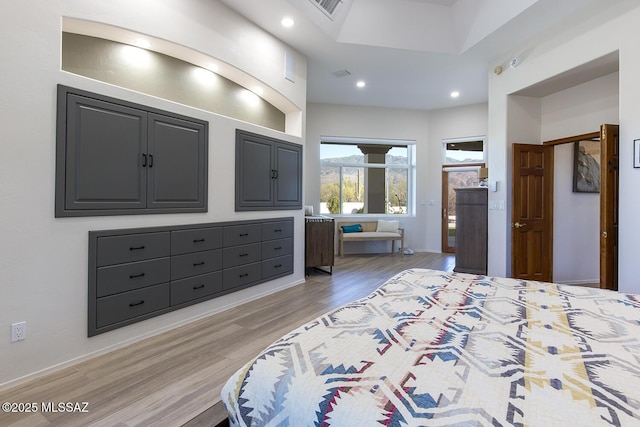 bedroom with light hardwood / wood-style flooring