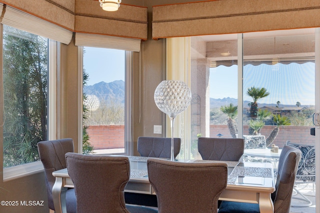 dining room with a mountain view