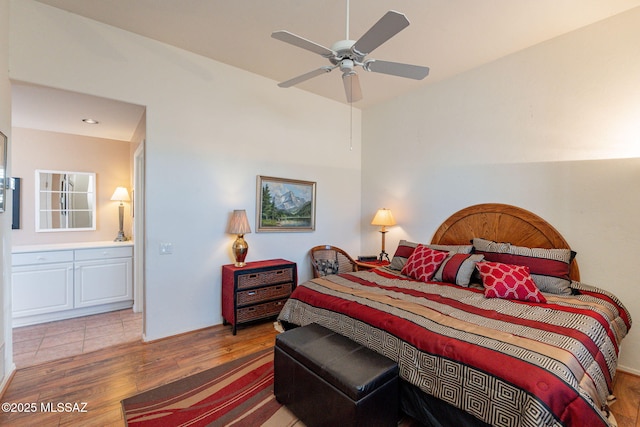 bedroom featuring ceiling fan and wood finished floors