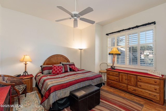 bedroom featuring ceiling fan and wood finished floors