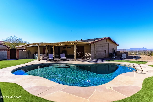 view of pool featuring a mountain view and a patio