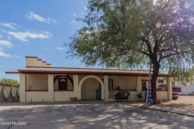 single story home with stucco siding