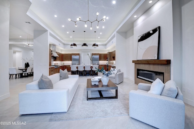 living room with a tray ceiling