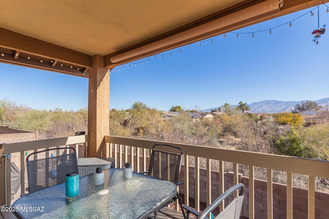 balcony featuring a mountain view