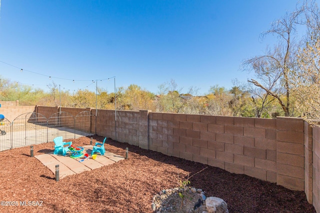 view of yard with a patio area