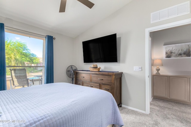 bedroom with lofted ceiling, light colored carpet, and ceiling fan