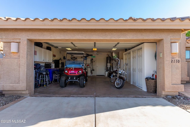 garage featuring gas water heater