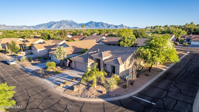 bird's eye view with a mountain view