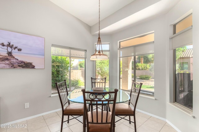 dining area with light tile patterned flooring