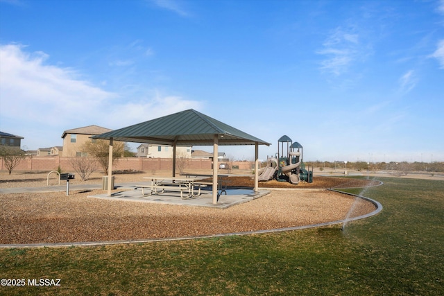 view of play area with a gazebo and a lawn