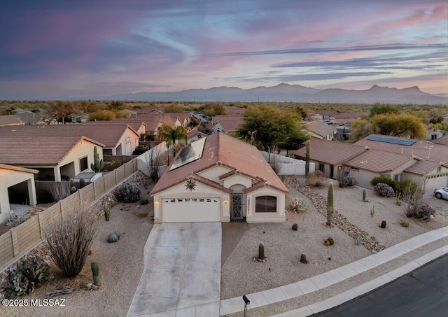 bird's eye view featuring a residential view and a mountain view