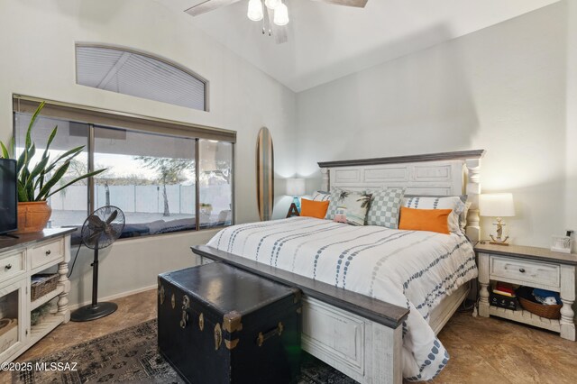 bedroom with lofted ceiling, ceiling fan, access to exterior, and baseboards