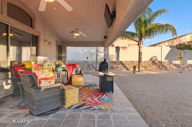 view of patio featuring fence