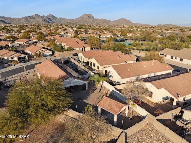 drone / aerial view featuring a mountain view and a residential view