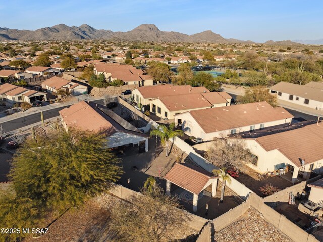 bird's eye view with a residential view and a mountain view