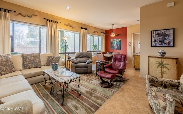 living area with recessed lighting and tile patterned floors
