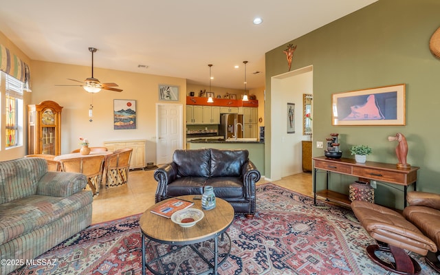 living area with recessed lighting, light tile patterned flooring, ceiling fan, visible vents, and baseboards